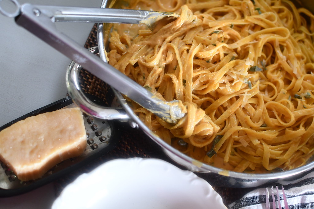 pumpkin alfredo noodles in large pot 