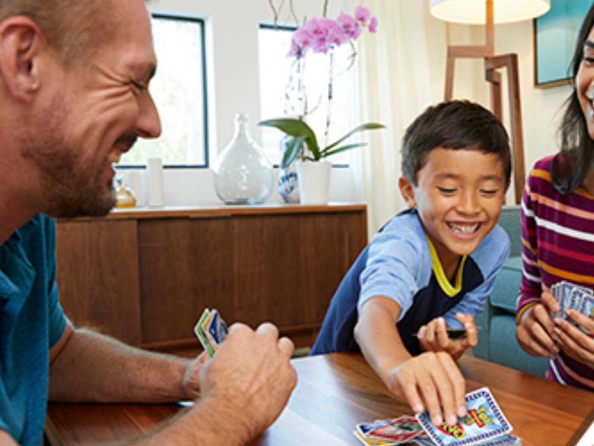 family playing uno card game