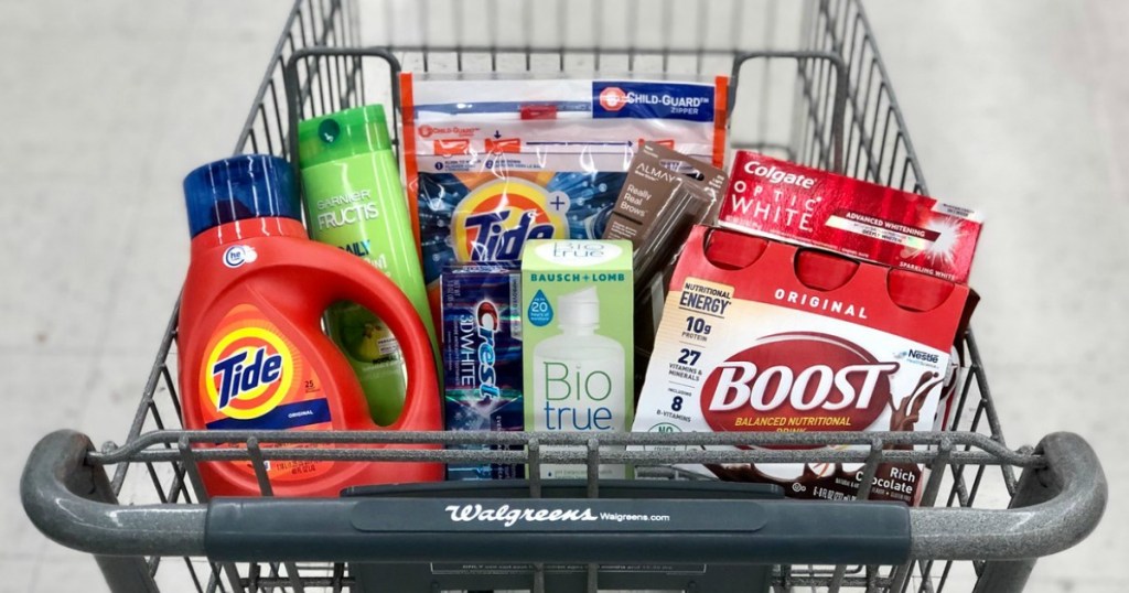 tide laundry detergent, garnier shampoo, crest and colgate toothpaste, biotrue contact lens solution and boost nutritional shakes in shopping cart at walgreens