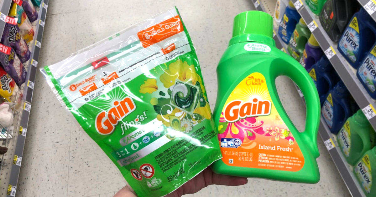 gain flings and liquid detergent hand holding