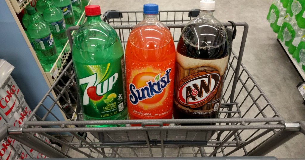 three bottles of soda