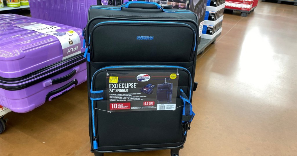 american tourister luggage on floor at walmart