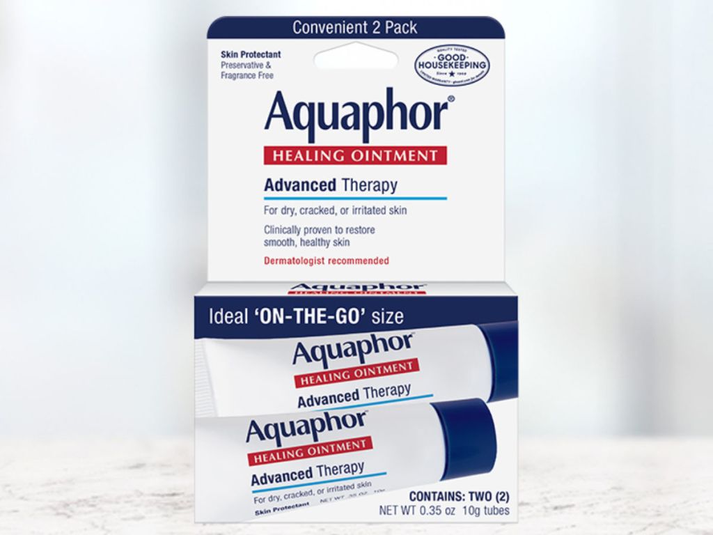 Aquaphor Healing Ointment On The Go on marble background