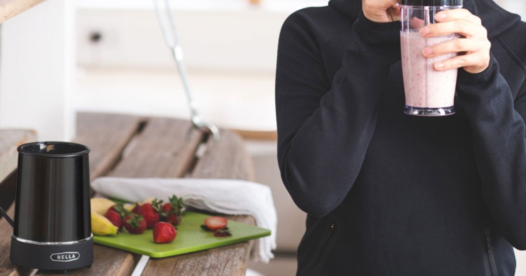 woman drinking smoothie with bella rocket blender