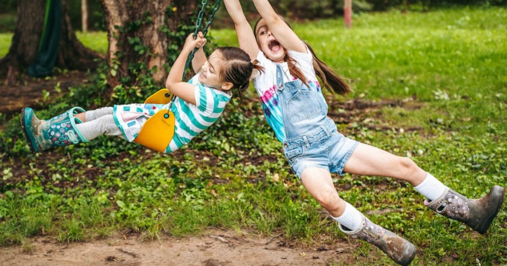 girls playing in Bogs Kids Boots