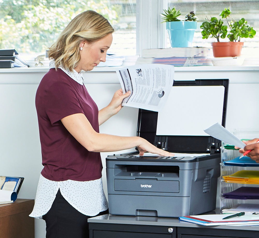 Brother Monochrome all-in-one printer on file cabinet