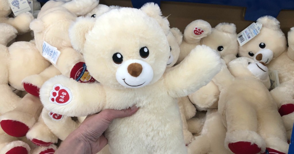 hand holding Build-A-Bear Bear