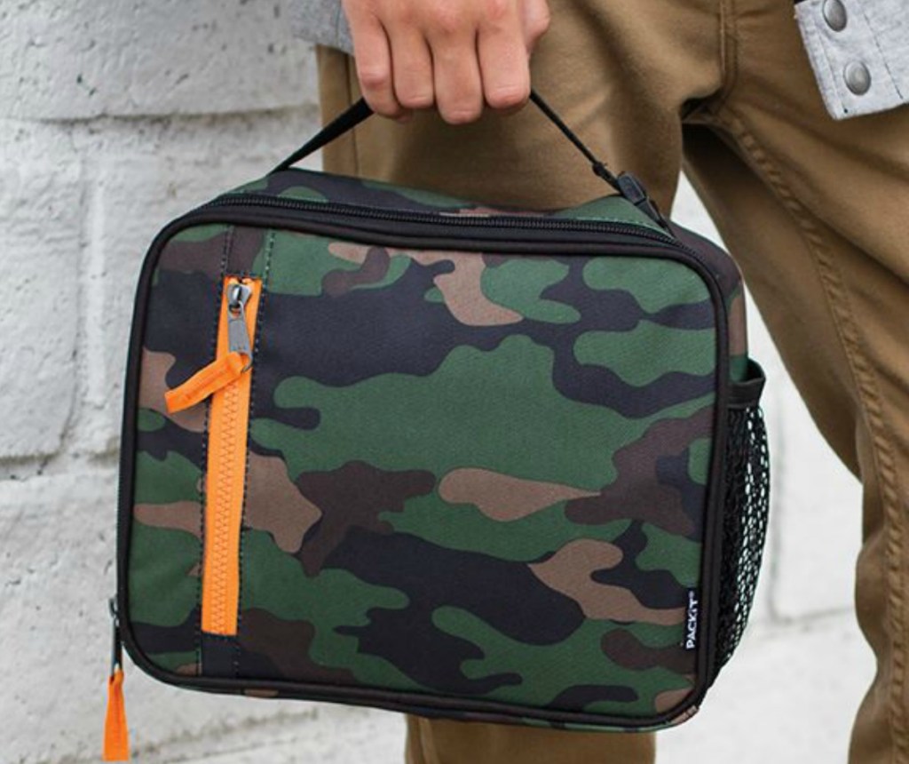 Classic Camo print lunch box in hand at school