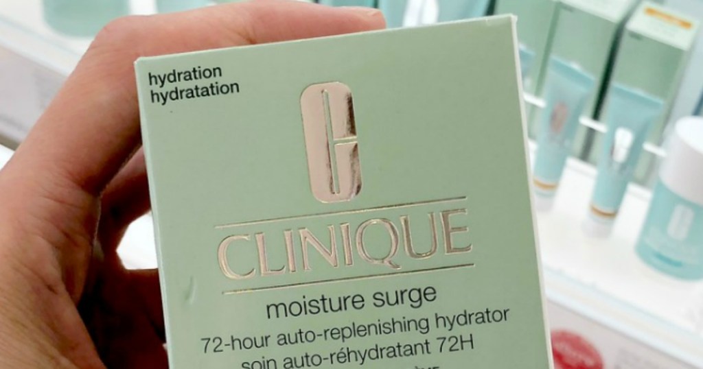 hand holding Clinique Moisture Surge