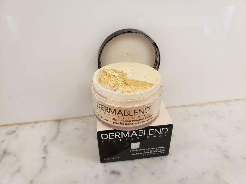 Dermablend Illuminating banana powder open jar