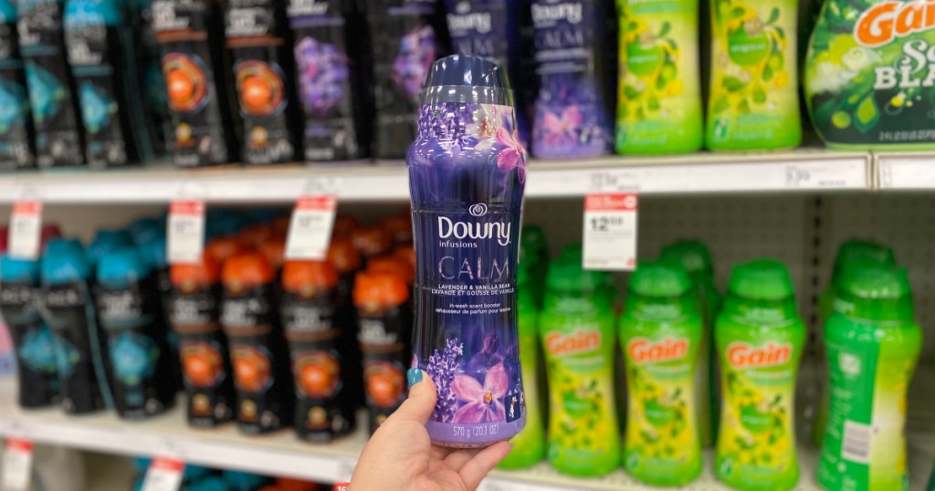 hand holding up bottle of downy infusions at target