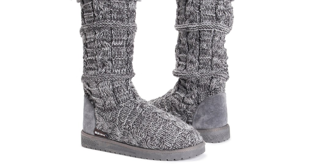 pair of gray muk luks boots