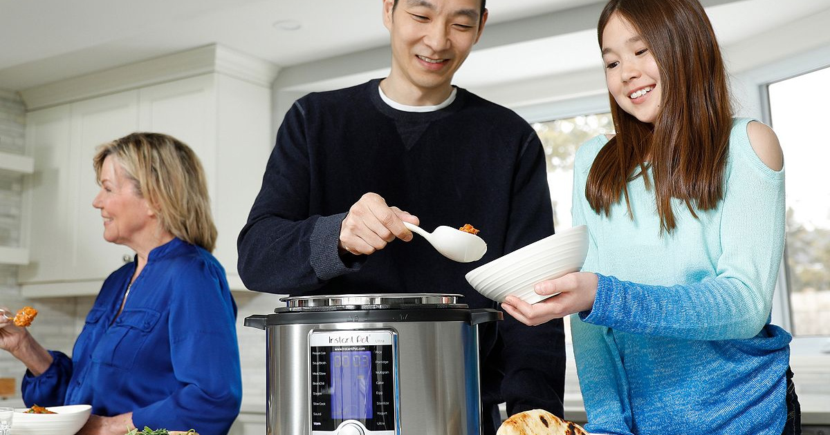 family around instant pot ultra eating dinner