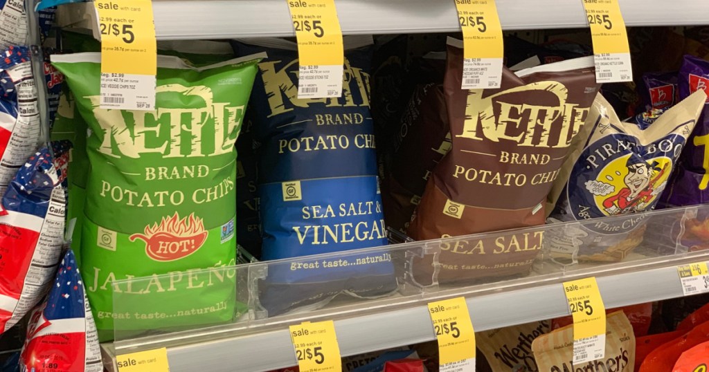 kettle brand bags of chips on shelf at store