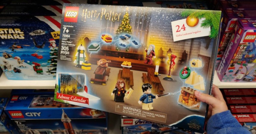 person holding the LEGO Harry Potter Advent Calendar 2019