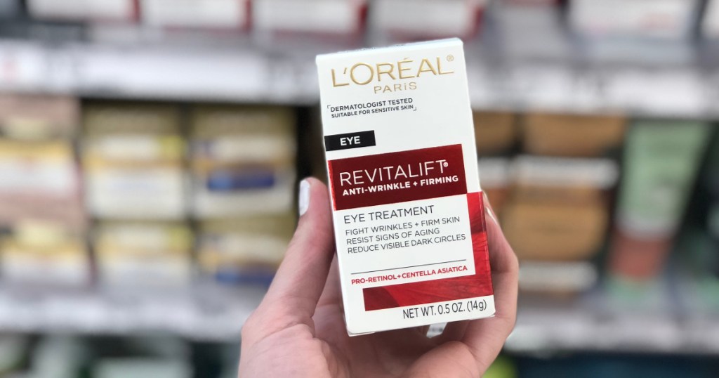 hand holding up box of loreal ani wrinkle cream