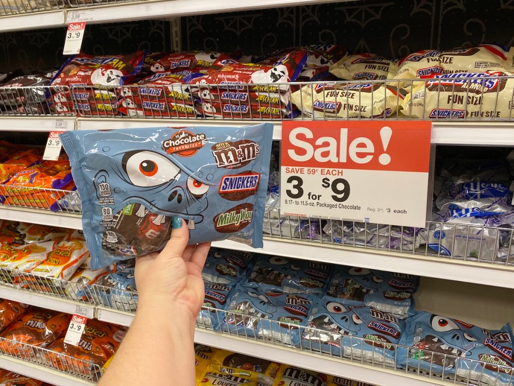 hand holding Mars Variety Pack of candy at Target