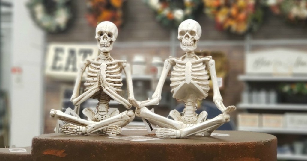 Yoga posed Skeletons on counter at Michaels