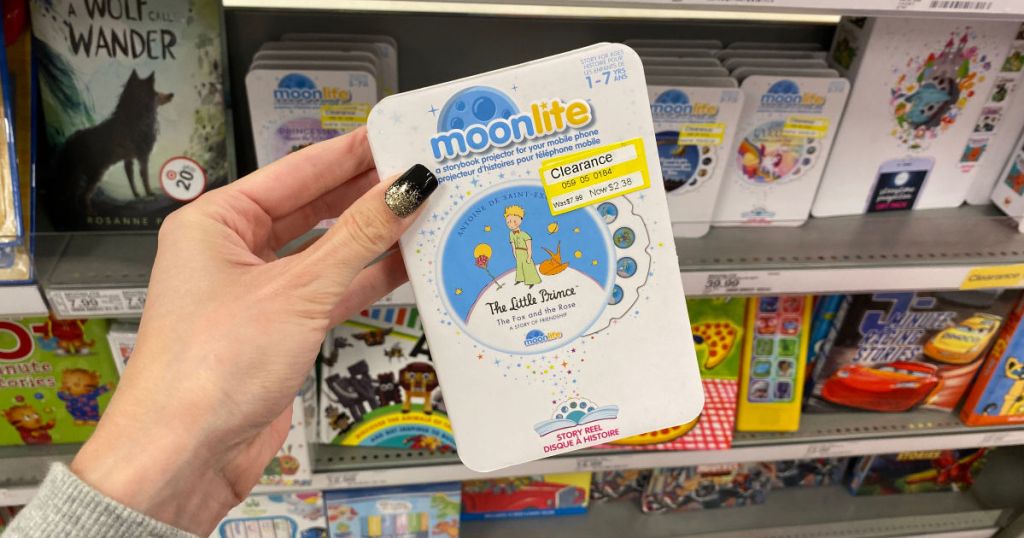 hand holding up moonlite book