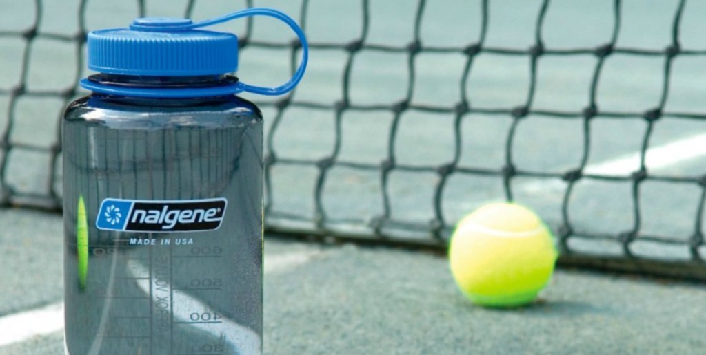 Blue Water Bottle from Nalgene in tennis court 