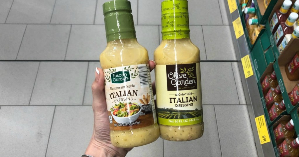 holding Olive Garden and ALDI italian salad dressings 