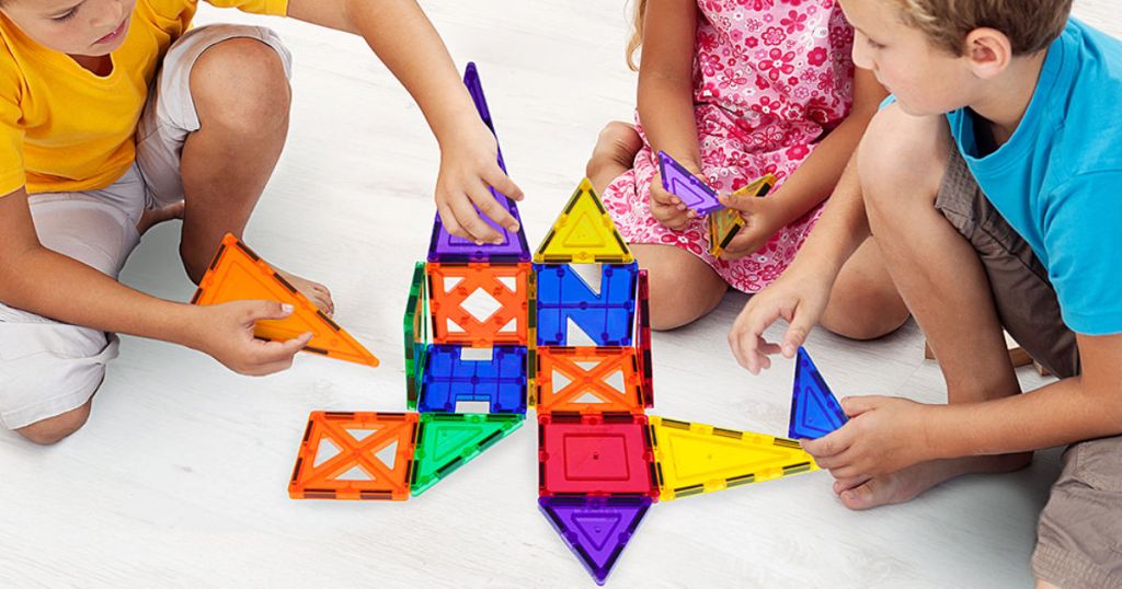 kids playing with picasso tiles set