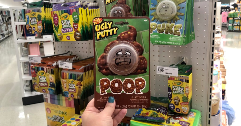 hand holding up poop ugly putty at target