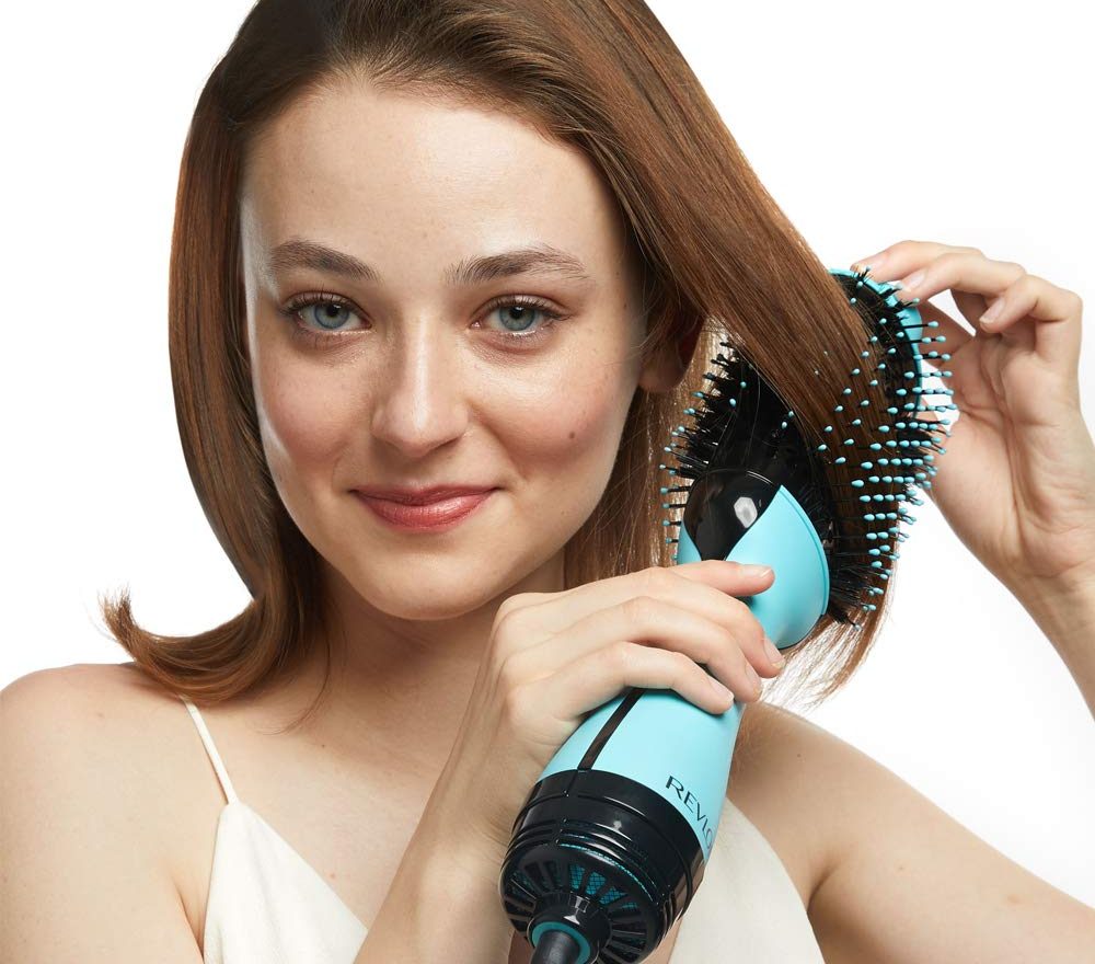 person using their Revlon Hair Dryer on hair