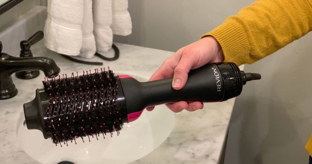 Revlon Hair Dryer And Volumizer being held in hand