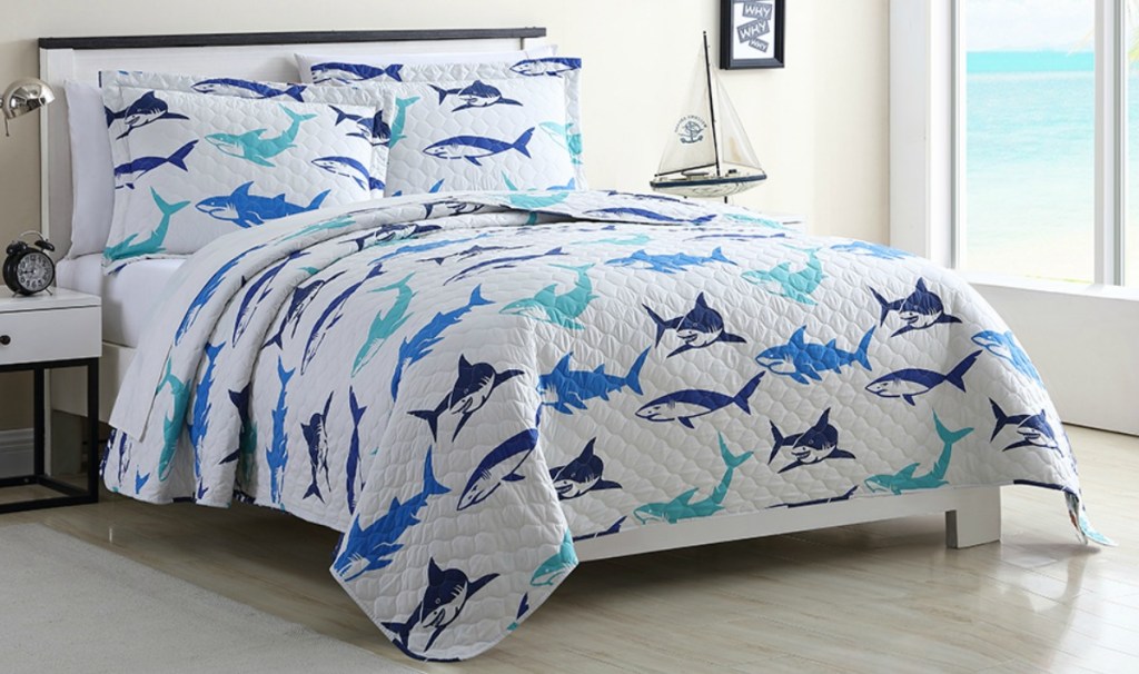 Shark print kids quilt from Zulily on full size bed