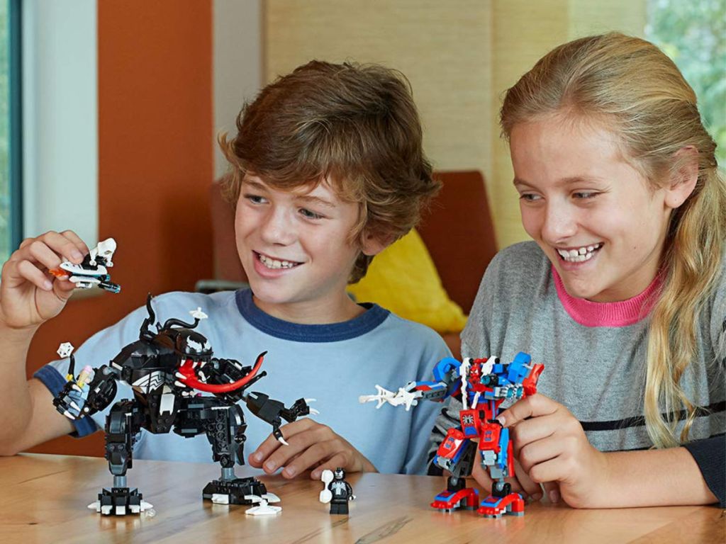 kids playing with Spider-Man Spider Mech vs. Venom