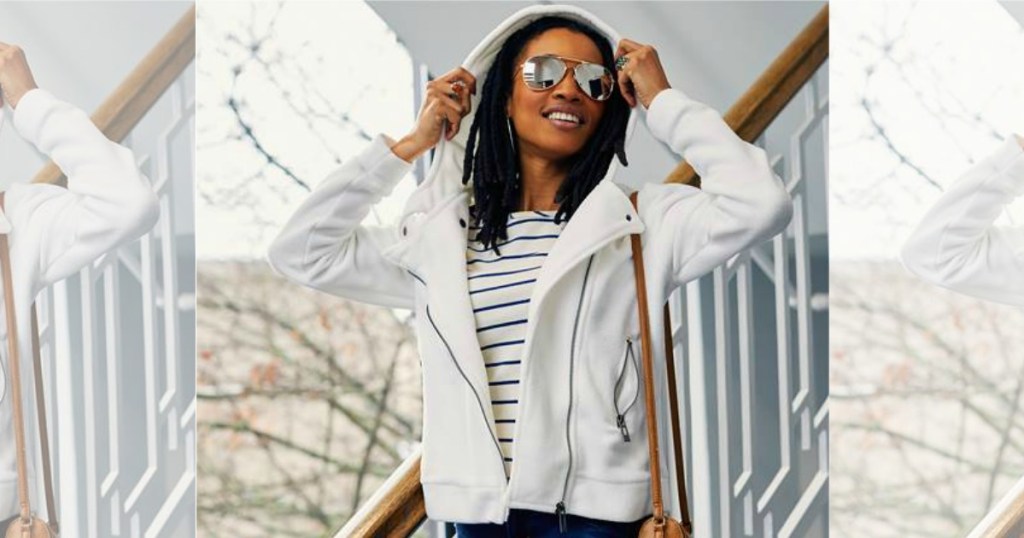 woman wearing white moto jacket