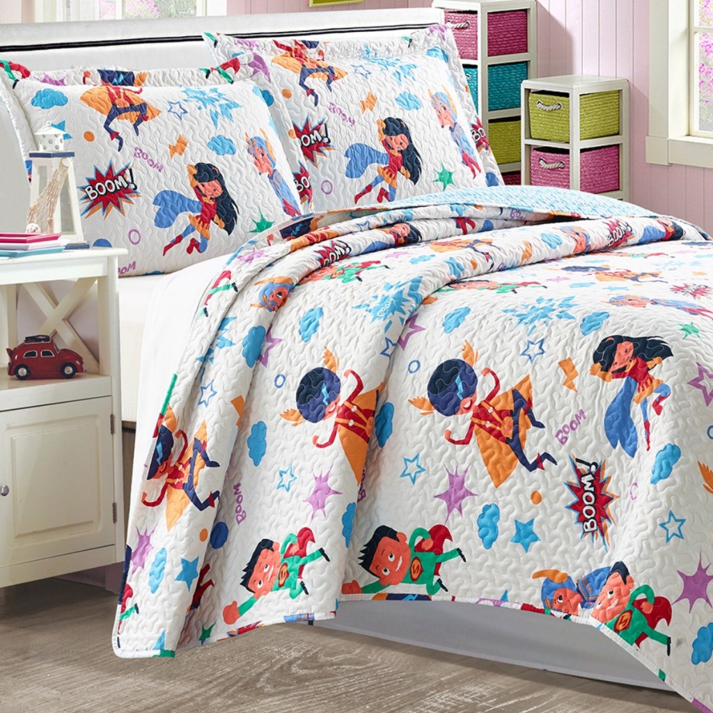 Super hero print quilt on twin size bed from Zulily