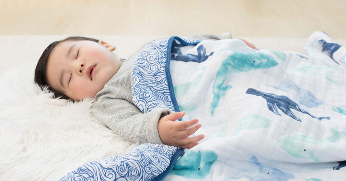 baby sleeping in whale blanket