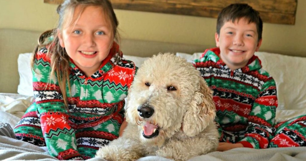 kiddos with puppy in matching pjs