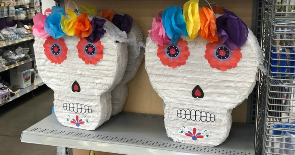 shelf in store with skull pinatas