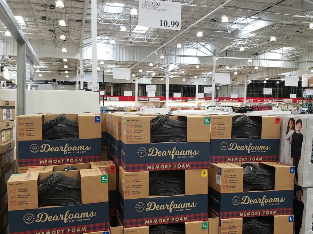 store display with boxes of men's slippers