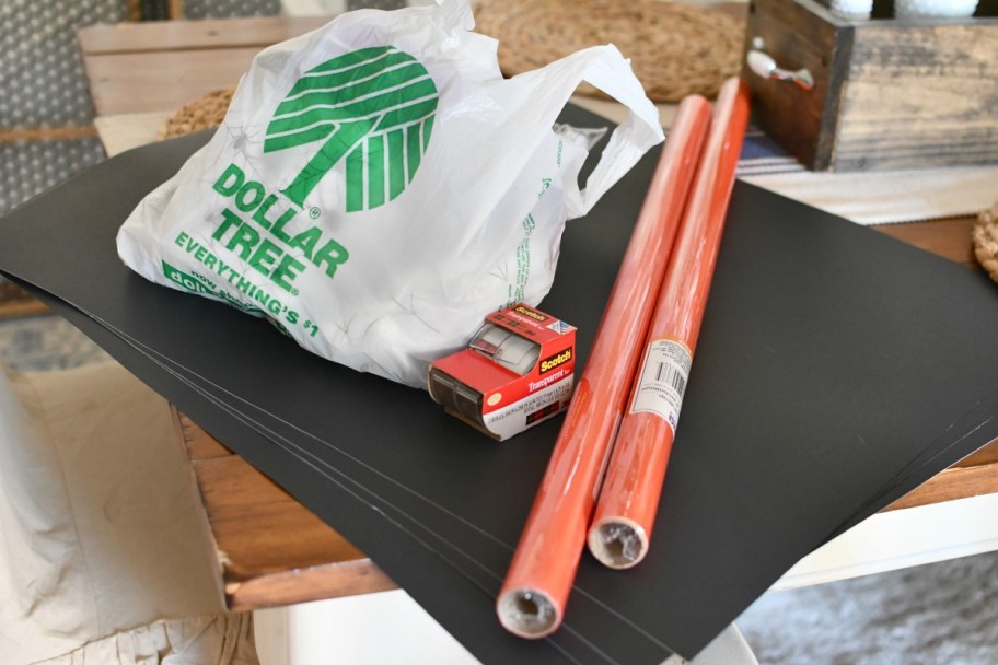 dollar tree supplies for Halloween door decor of a jack o lantern