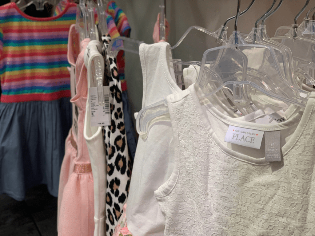 dresses hanging on store racks