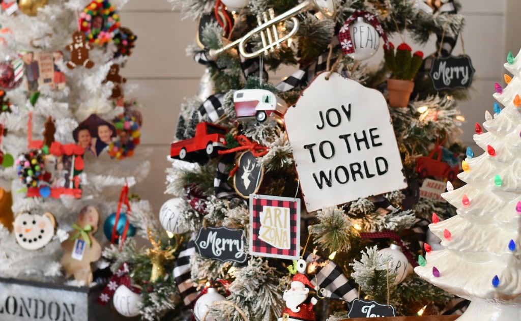 joy to the world sign on christmas tree