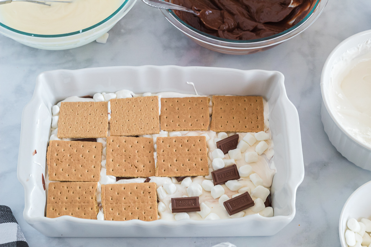 layering of more smores lasagna