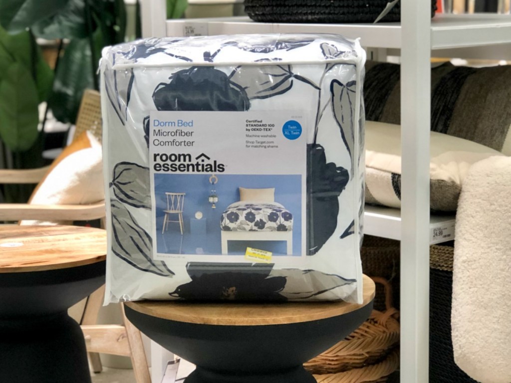 mattress wrapped in packaging on table in store