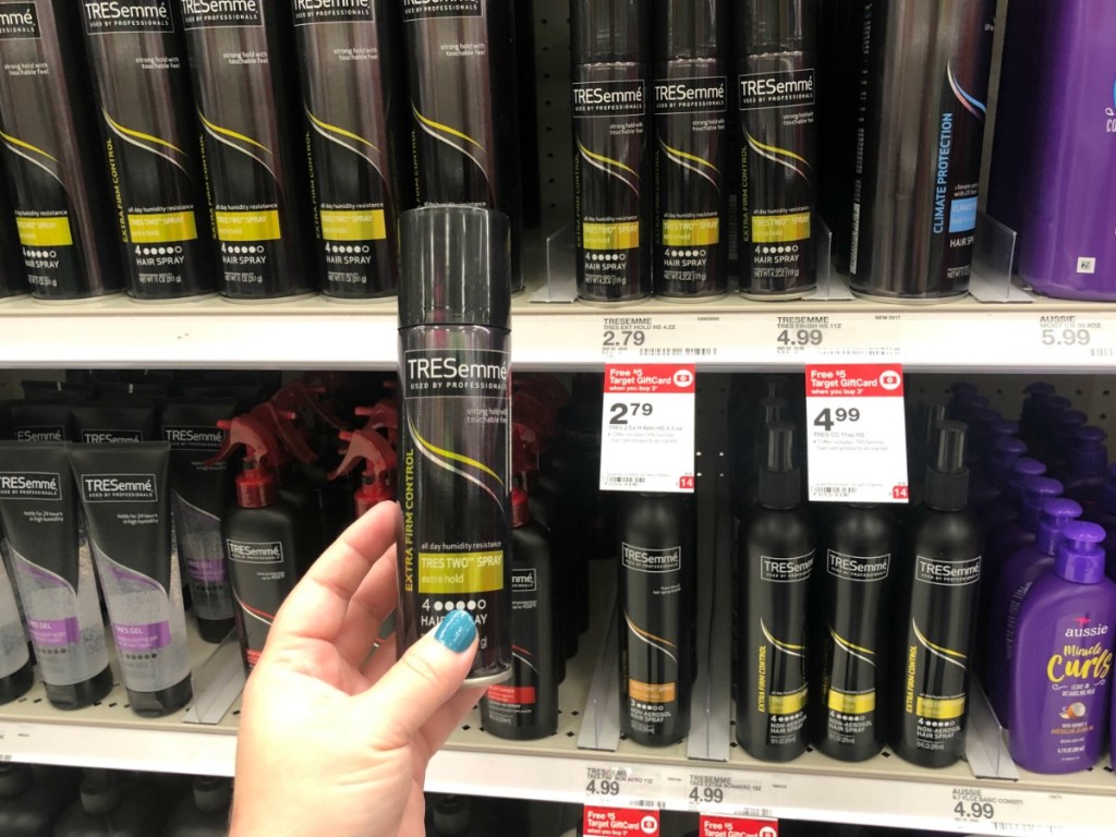 hand holding tresemme hair spray