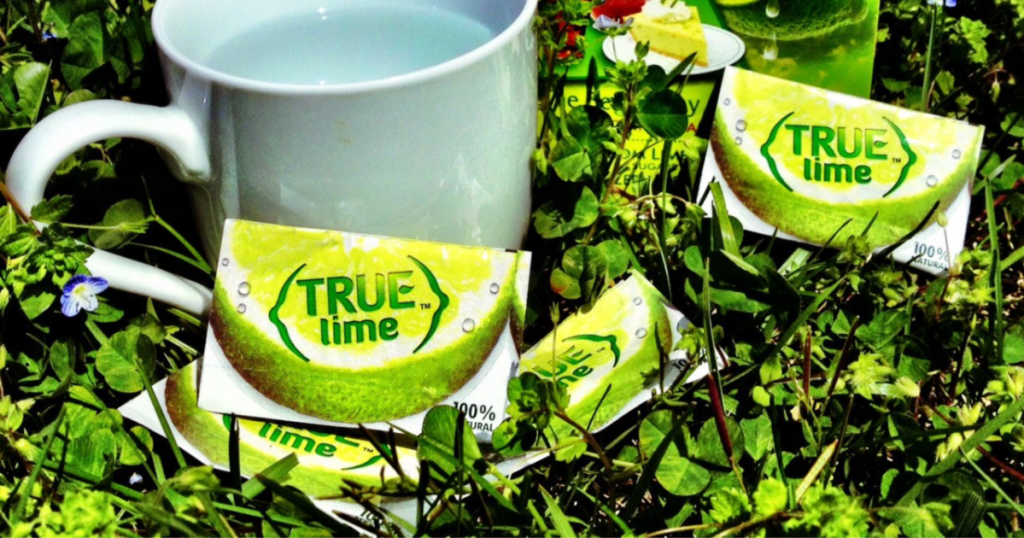 true lime packets with mug of water