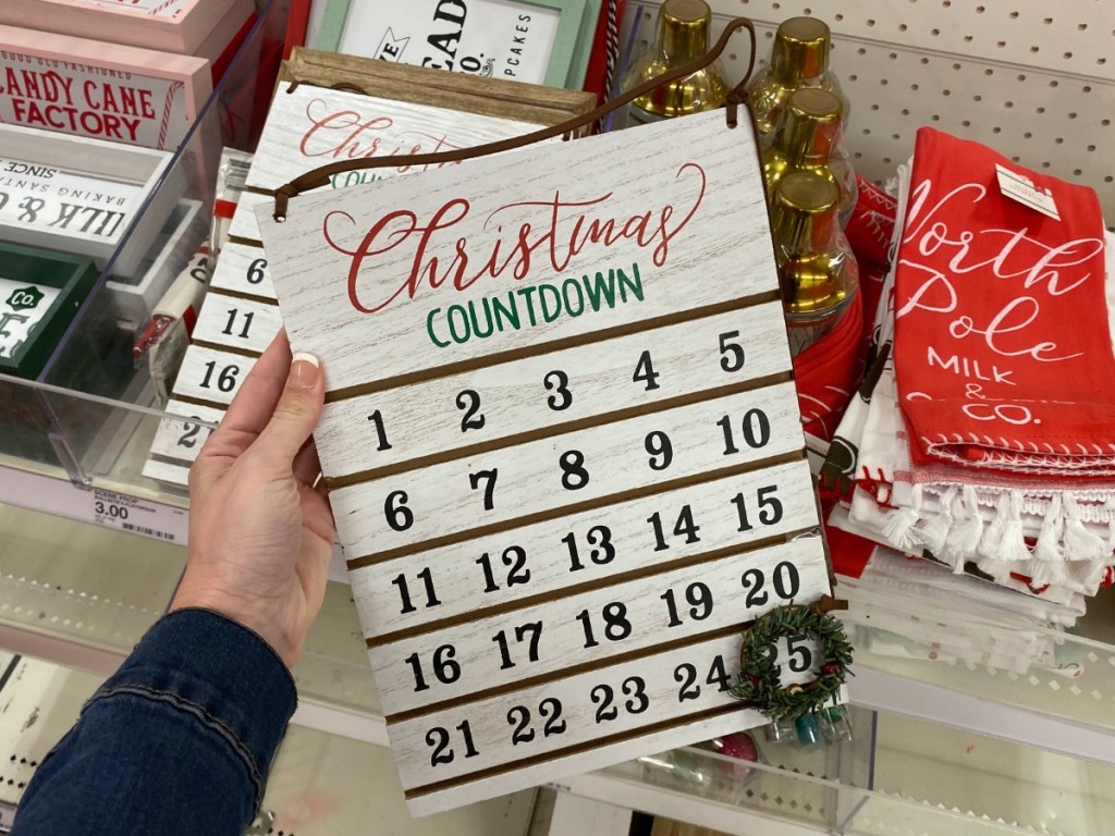 Hand holding a Christmas Countdown Calendar