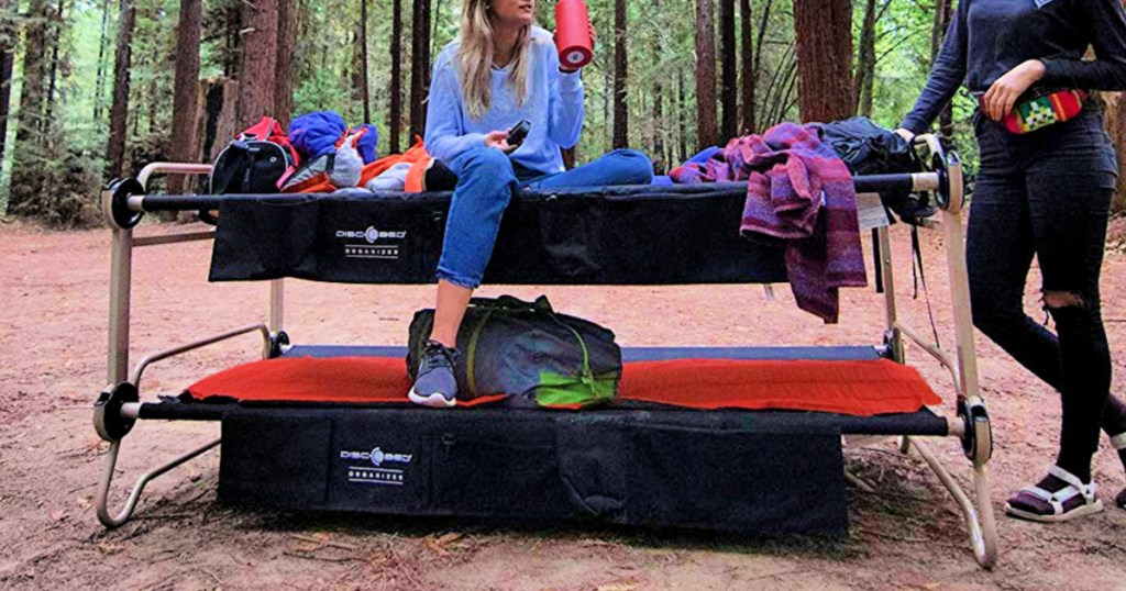 Disc-O-Bed with Organizers in forest with campers