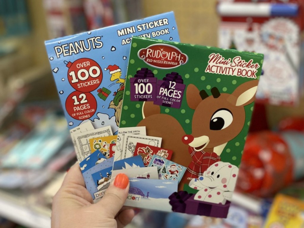 Holiday Mini Sticker Activity books in hand at Target