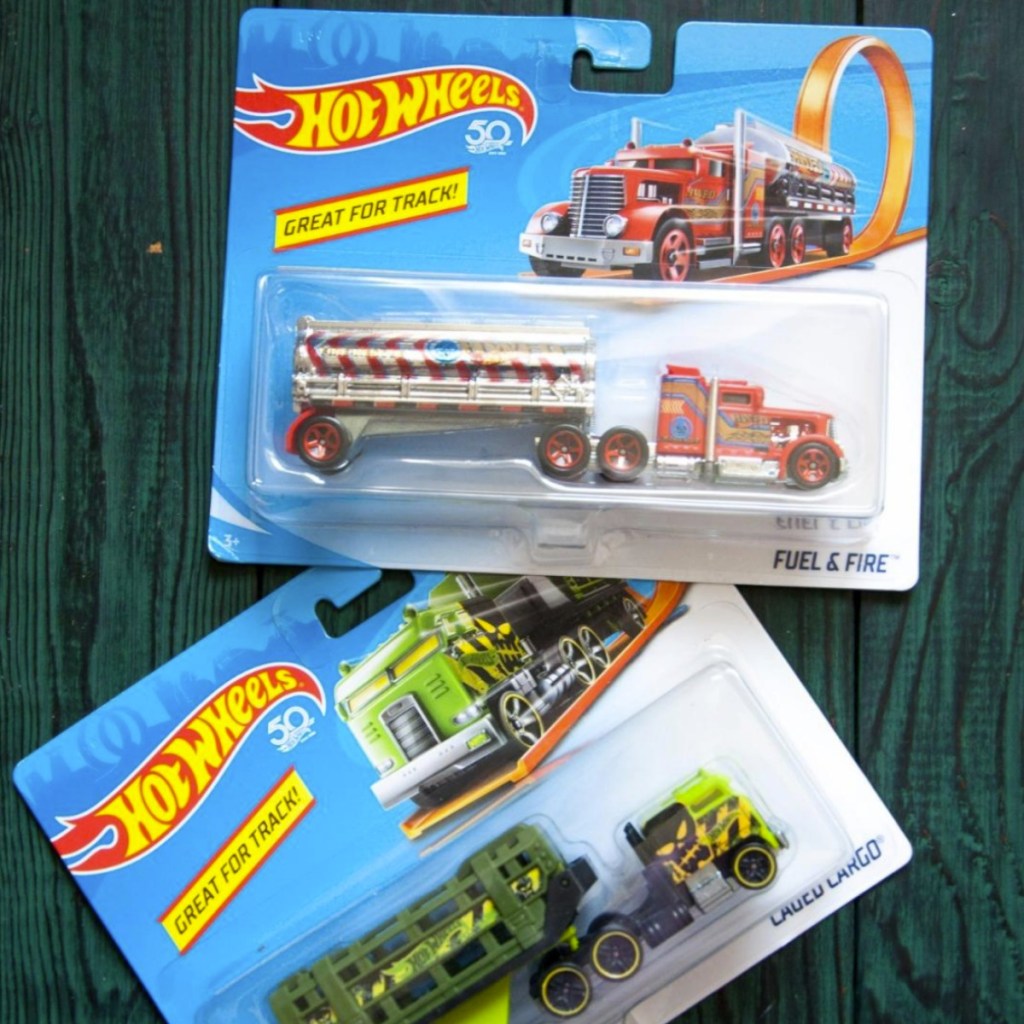 Hot Wheels Track Stars Trucks in package on green wooden background