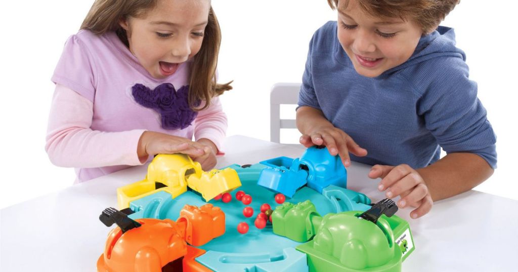 kids playing hungry hippos game