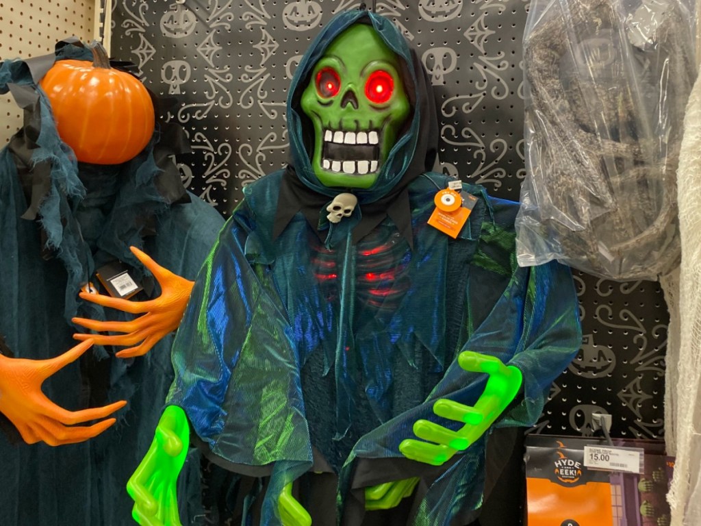 Green illuminating halloween decor on display at Target